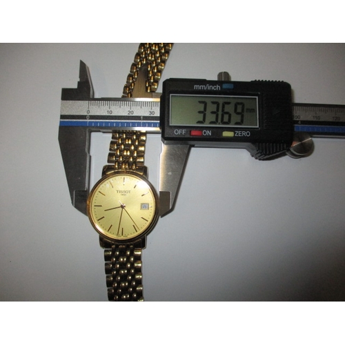 83 - A Tissot 870/970 quartz watch, with date window, in good working order