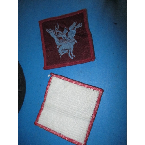 262 - Two post was parachute regiment berets with cap badges and associated cloth badges, in good pre-owne... 