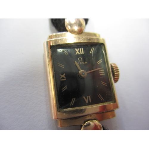 84 - A ladies gold cased Omega cocktail watch, in the Art Deco style dating C1947, runs when wound, strap... 