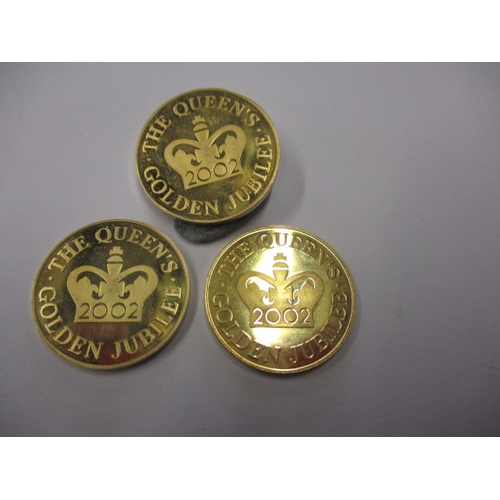 151 - Three 2002 Queens golden jubilee commemorative coins, believed to be 9ct gold and each weighing appr... 