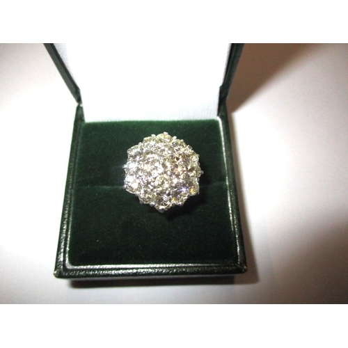 24 - An 18ct white gold diamond cluster ring, having approx. 4ct diamond in total, approx. ring size ‘N+’... 