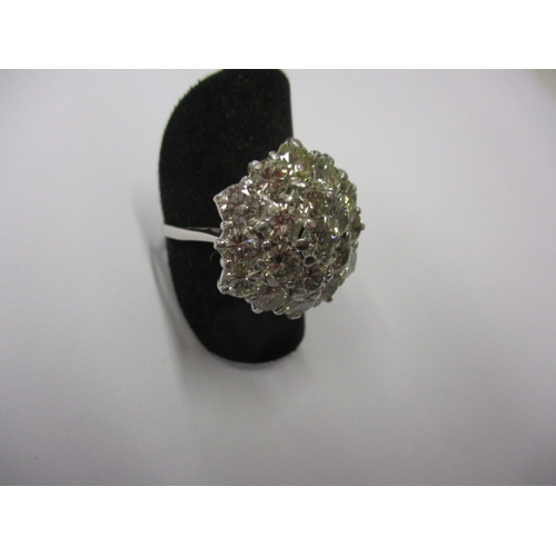 24 - An 18ct white gold diamond cluster ring, having approx. 4ct diamond in total, approx. ring size ‘N+’... 