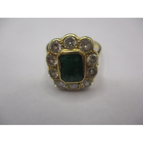 25 - An antique 18ct yellow gold diamond and emerald ring, approx. ring size ‘N’ set with 10 diamonds and... 