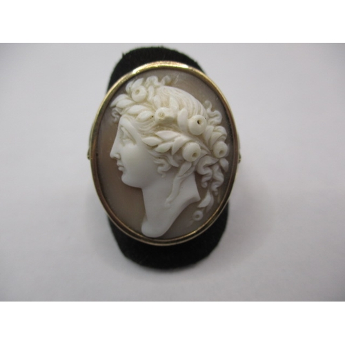 26 - A 9ct yellow gold cameo ring, approx. ring size ‘S’ approx. weight 7.2g with a well carved shell cam... 