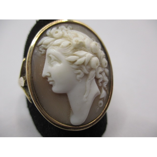 26 - A 9ct yellow gold cameo ring, approx. ring size ‘S’ approx. weight 7.2g with a well carved shell cam... 