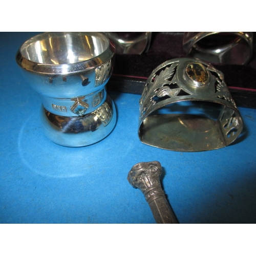 202 - A parcel of silver and white metal items, to include napkin rings and a jug, all in good used condit... 