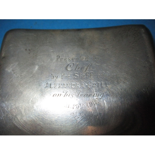 196 - An antique sterling silver cigarette case, with dedication dated April 1912, having some denting, ap... 