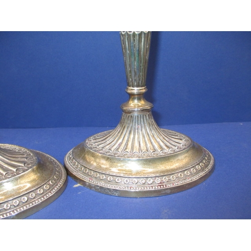 177 - A pair of 19th century silver candlesticks, approx. height 19.5cm in the neoclassical style, London ... 