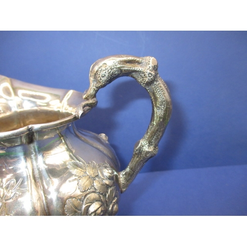 199 - An antique sterling silver cream jug, in good used condition, approx. weight 273g (B)