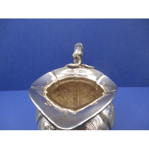 199 - An antique sterling silver cream jug, in good used condition, approx. weight 273g (B)