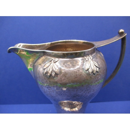 200 - An Art Nouveau sterling silver cram jug, makers mark for A E Jones, in good used condition, approx. ... 