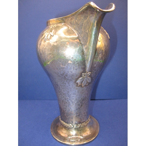 200 - An Art Nouveau sterling silver cram jug, makers mark for A E Jones, in good used condition, approx. ... 