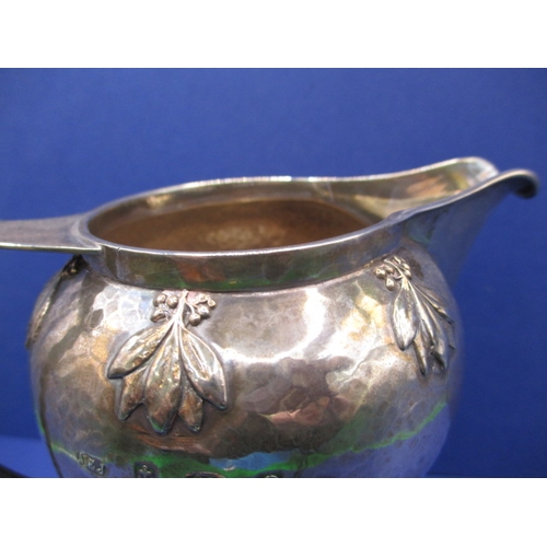 200 - An Art Nouveau sterling silver cram jug, makers mark for A E Jones, in good used condition, approx. ... 