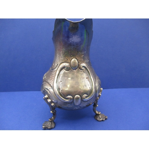 207 - A Victorian sterling silver cream jug, in good used condition with vacant cartouche, approx. weight ... 