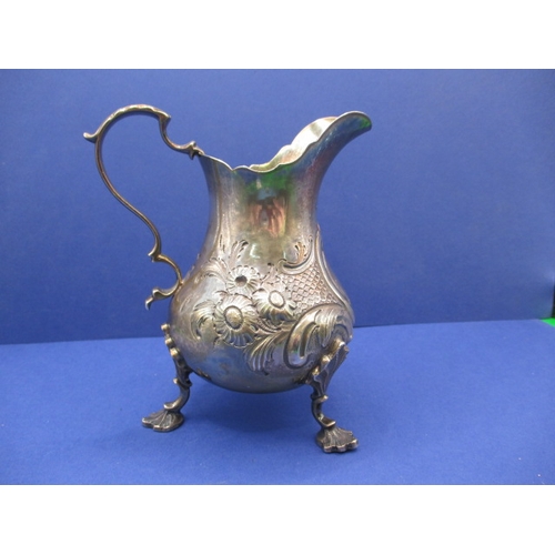 207 - A Victorian sterling silver cream jug, in good used condition with vacant cartouche, approx. weight ... 