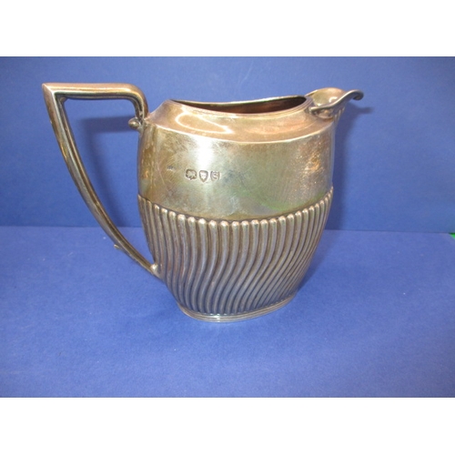 210 - Two antique sterling silver cream jugs, both in good used condition, approx. gross parcel weight 236... 