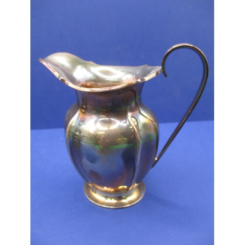 220 - Two vintage sterling silver cream jugs, both in good pre-owned condition, approx. gross parcel weigh... 