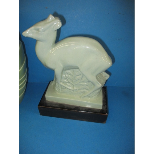 277 - An Art Deco Wedgwood antelope by Jack Skeaping and an art deco vase by Bretby, both in good used con... 