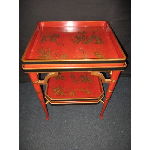 313 - A vintage oriental red lacquer ware two tier tray table, approx. dimensions H: 60cm W: 47cm D: 43cm ... 