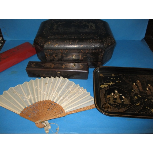 266 - A parcel of vintage Chinese lacquer ware boxes to include a fitter work box and a fan box, all in go... 