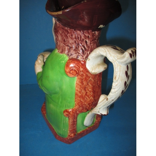 286 - An antique Toby Jug, dating c1830, approx. height 24.5cm having some enamel loss and minor chipping