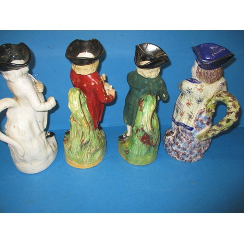 287 - Four 19th century Toby Jugs all approx. 29cm high, some damages