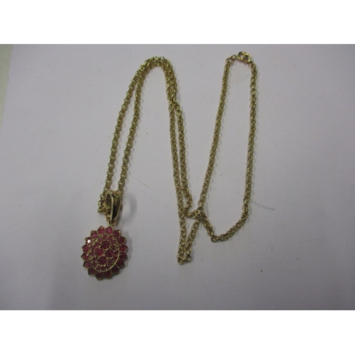 57 - A 9ct yellow gold necklace chain with synthetic ruby set pendant, approx. linear length 54cm, approx... 