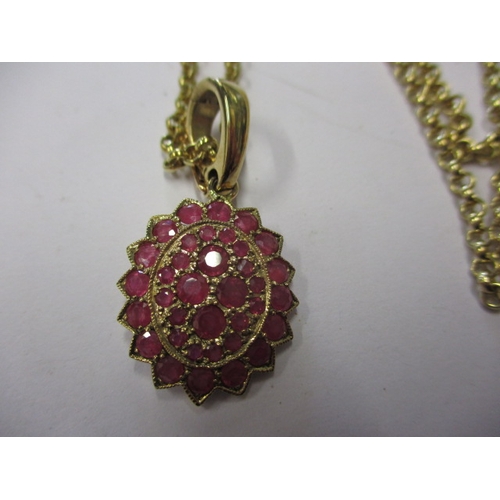 57 - A 9ct yellow gold necklace chain with synthetic ruby set pendant, approx. linear length 54cm, approx... 