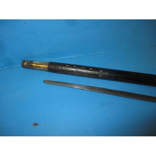 265 - A vintage Indian made sword stick, having age related ware and repairs, approx. length 88cm