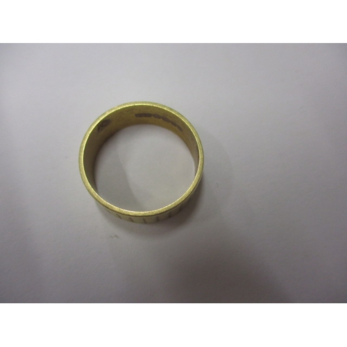 42 - An 18ct yellow gold wedding band, approx. ring size ‘N’, approx. width 6.6mm, approx. weight 4.85g, ... 