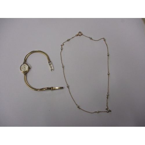 61 - A vintage 9ct gold and seed pearl necklace and a 9ct gold watch and strap, approx. gross parcel weig... 