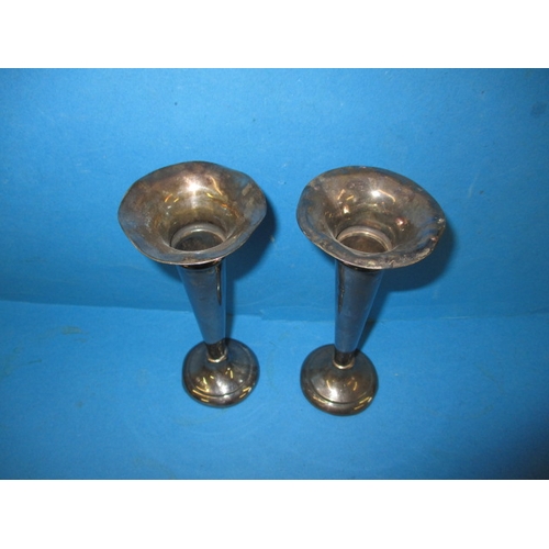 215 - A pair of sterling silver bud vases, plaster loading removed and some dents, approx. height 17cm, ap... 