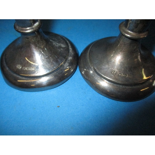 215 - A pair of sterling silver bud vases, plaster loading removed and some dents, approx. height 17cm, ap... 