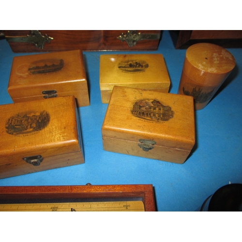 298 - A quantity of treen items, to include antique tea caddies, a stationary box and Mauchline ware boxes... 