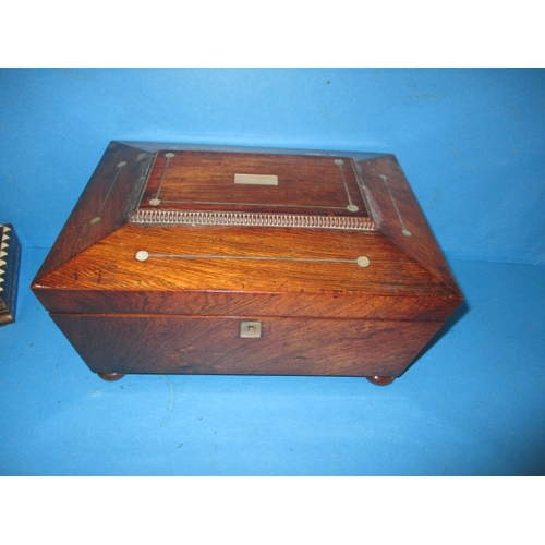 298 - A quantity of treen items, to include antique tea caddies, a stationary box and Mauchline ware boxes... 