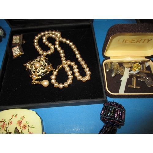 235 - A parcel of vintage costume jewellery, to include some silver items and a 585 gold brooch, all in us... 