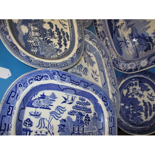 290 - A parcel of 19th century and later blue & white pottery platters, all in used condition, some minor ... 