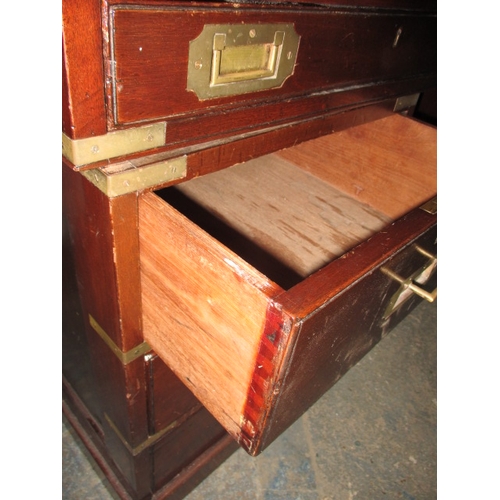 309 - A vintage campaign style desk with brass mounts and 8 drawers, comes in 3 parts for ease of transpor... 