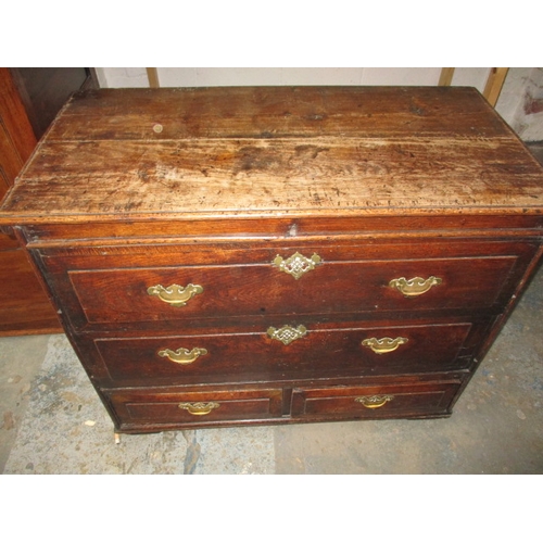 317 - An 18th century Welsh oak chest of drawers, having been modified to a type of mule chest with openin... 