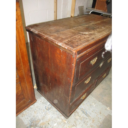 317 - An 18th century Welsh oak chest of drawers, having been modified to a type of mule chest with openin... 