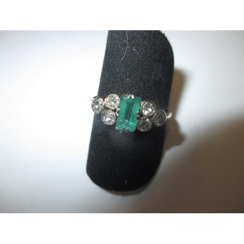 17 - A vintage 18ct yellow gold diamond and emerald dress ring, approx. ring size ‘M+’ emerald has some s... 