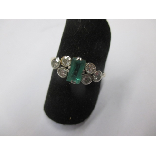 17 - A vintage 18ct yellow gold diamond and emerald dress ring, approx. ring size ‘M+’ emerald has some s... 