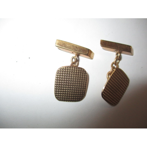 63 - A pair of 9ct yellow gold cufflinks, approx. gross weight 5.4g and a 9ct gold cased wrist watch, not... 