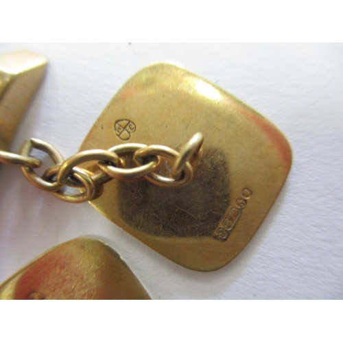 63 - A pair of 9ct yellow gold cufflinks, approx. gross weight 5.4g and a 9ct gold cased wrist watch, not... 