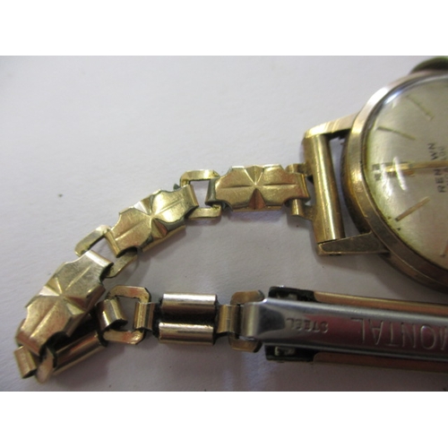 63 - A pair of 9ct yellow gold cufflinks, approx. gross weight 5.4g and a 9ct gold cased wrist watch, not... 