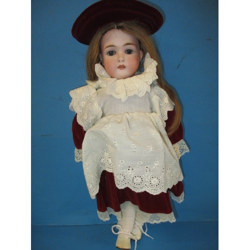 230 - An antique Jumeau? Porcelain head doll, having composite body and later clothes, one finger missing ... 