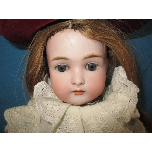 230 - An antique Jumeau? Porcelain head doll, having composite body and later clothes, one finger missing ... 