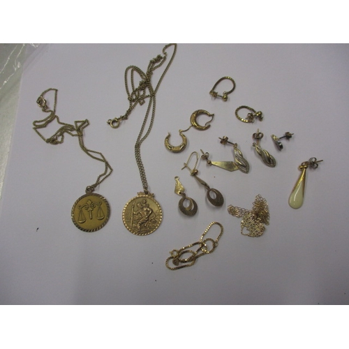 87 - A parcel of gold and yellow metal items, all in used condition, approx. gross parcel weight 24g