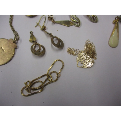 87 - A parcel of gold and yellow metal items, all in used condition, approx. gross parcel weight 24g