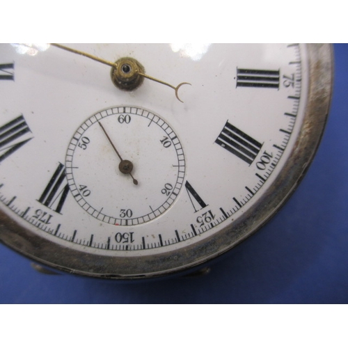 104 - A continental 935 silver cased pocket stop watch, in current working order with minor use-related ma... 